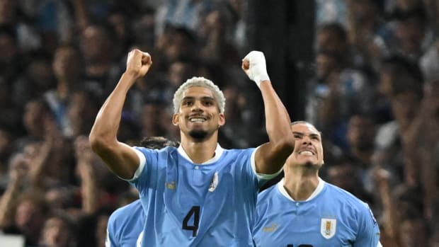 Ronald Araujo (center) and Darwin Nunez (right) pictured celebrating during Uruguay's 2-0 win over Argentina in November 2023